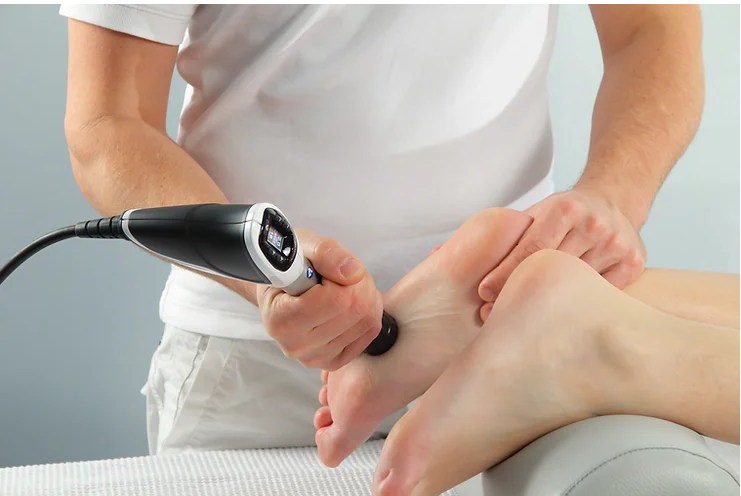 EPAT-Shockwave-Therapy-Clinics-in-New-Jersey
A shockwave therapy device being applied to a patient's foot.